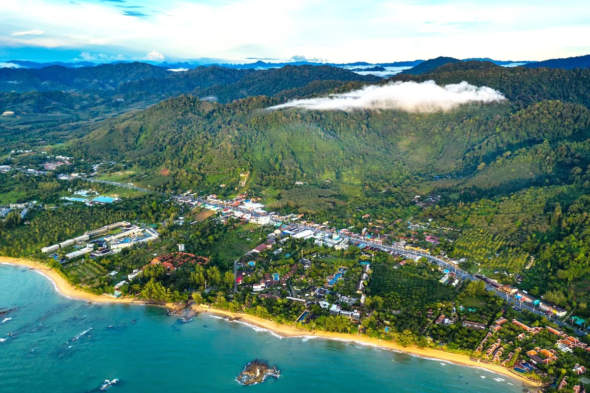 Aerial view of Khao Lak's coast and forested hills