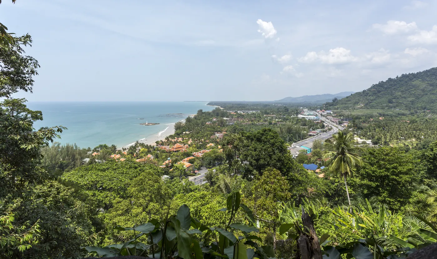 View from the hillside over Khao Lak's beach, main road and rainforest